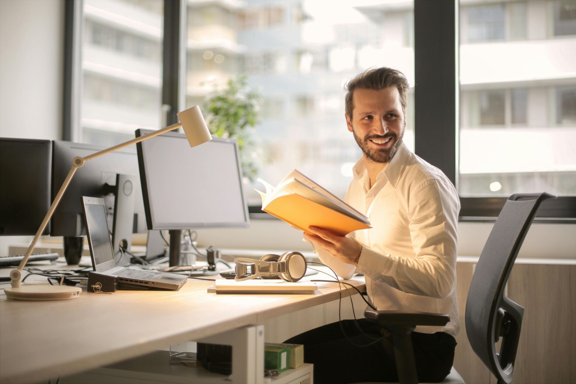 Man sitting in an office chair, focused on work