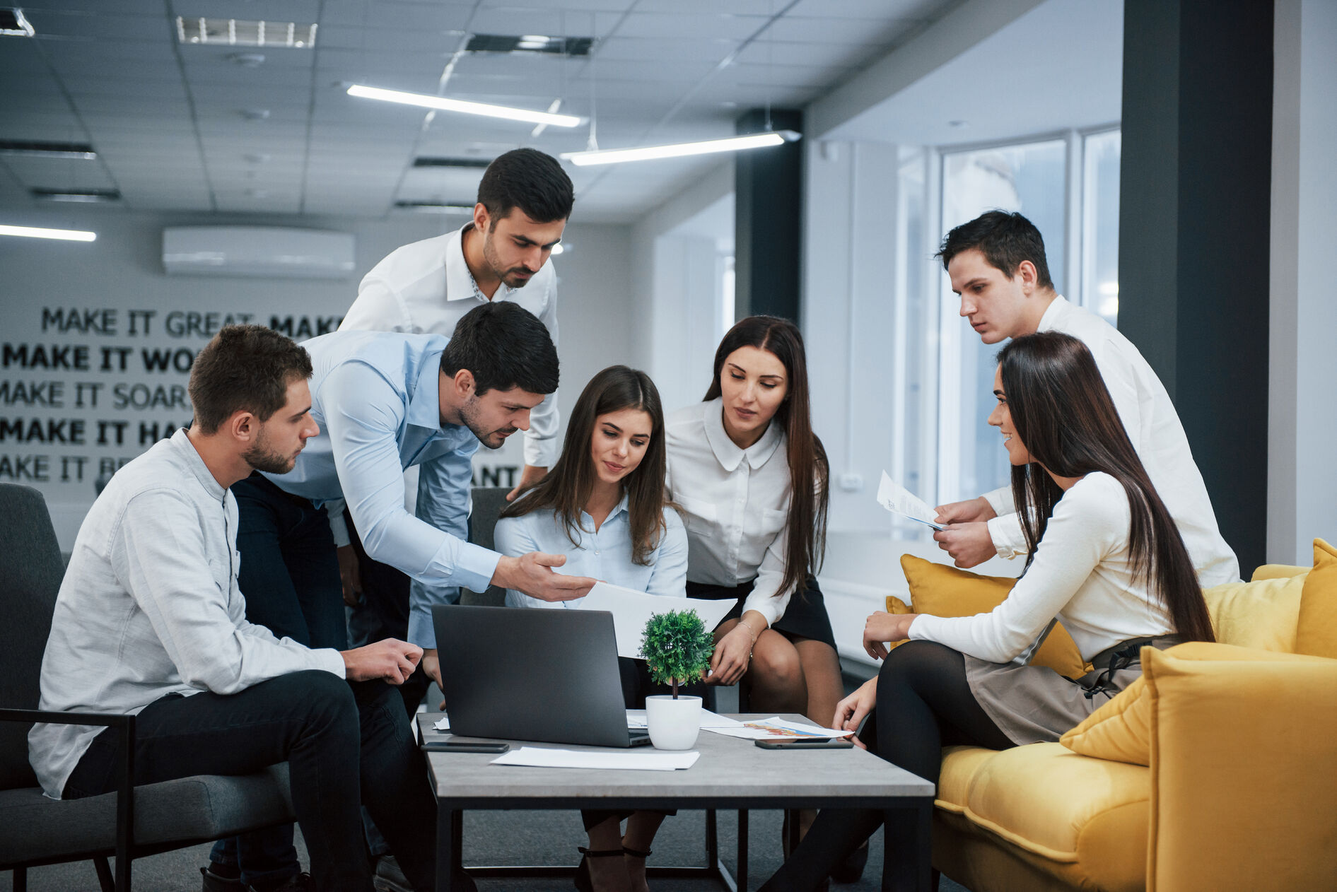 Team members collaborating during an office meeting